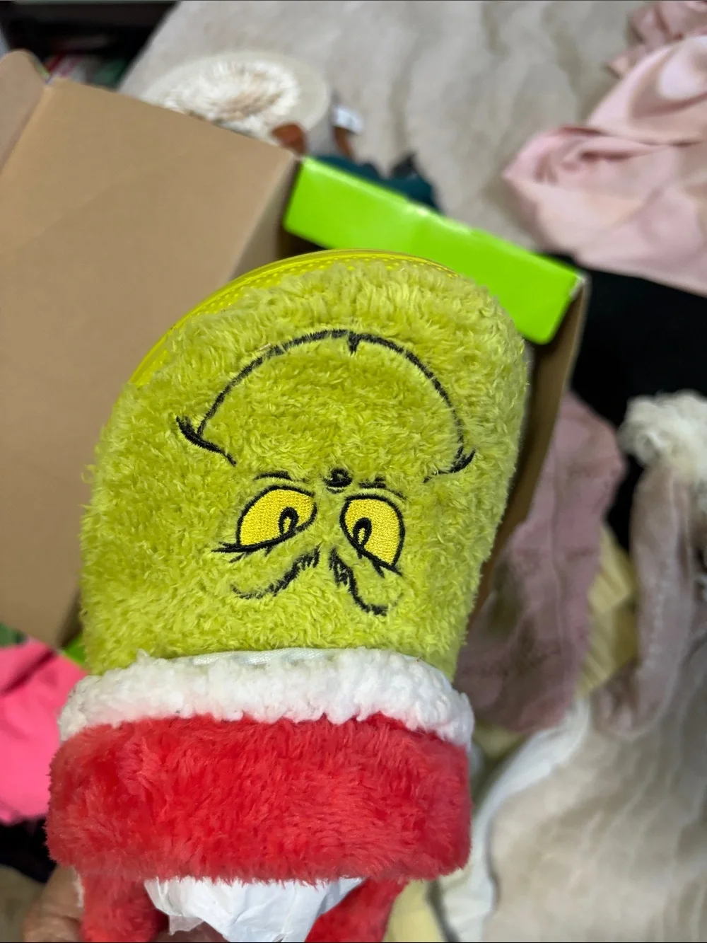 CROCS Kids Grinch Plush Slip-Ons in Green and Red